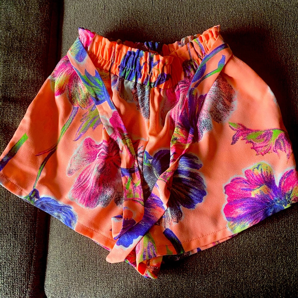 Floral coral shorts. Size small juniors.